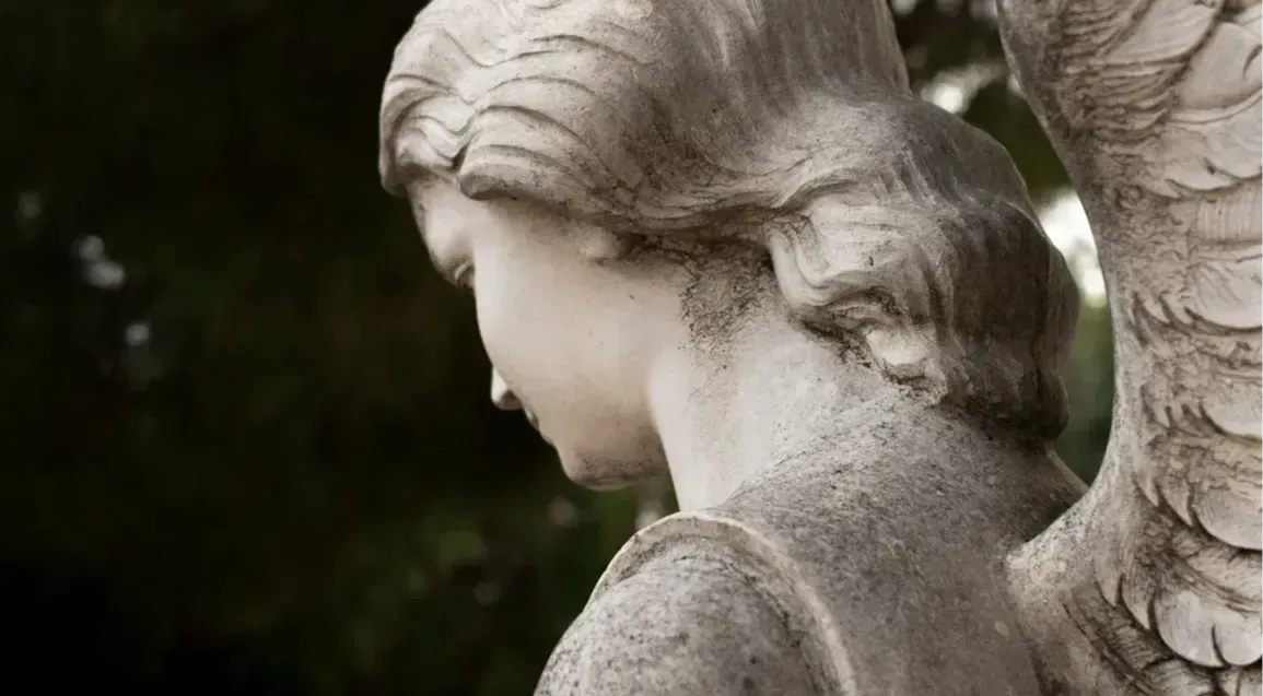 A close up of a statue of an angel